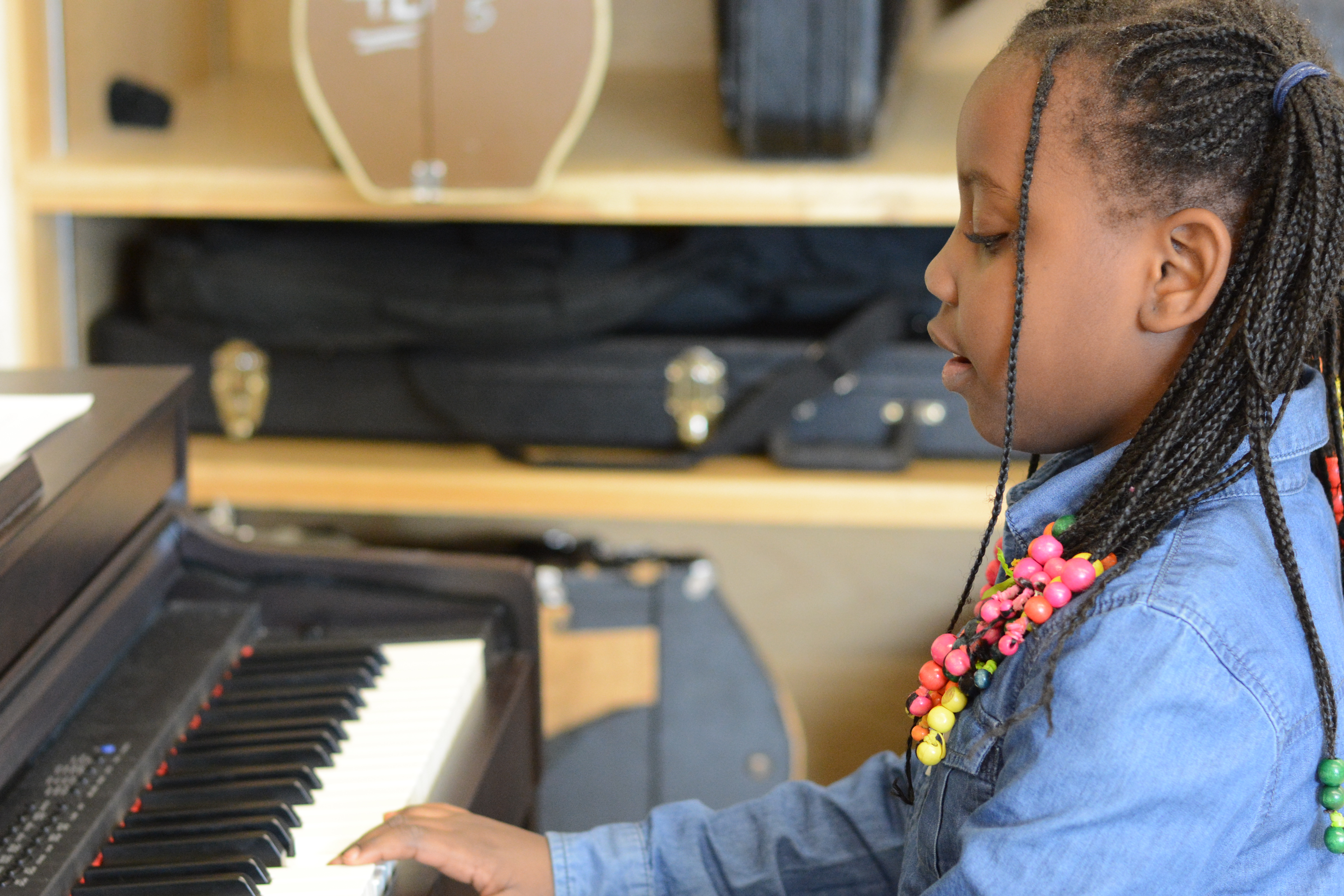 A girl plays the piano